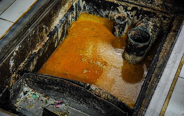 grease trap cleaning helps prevent grease and oil from entering the sewer system, therefore reducing the risk of environmental contamination